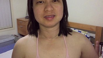 Asian Milf Teases Her Wet Pussy In Pink Stockings For Xvideos Fans